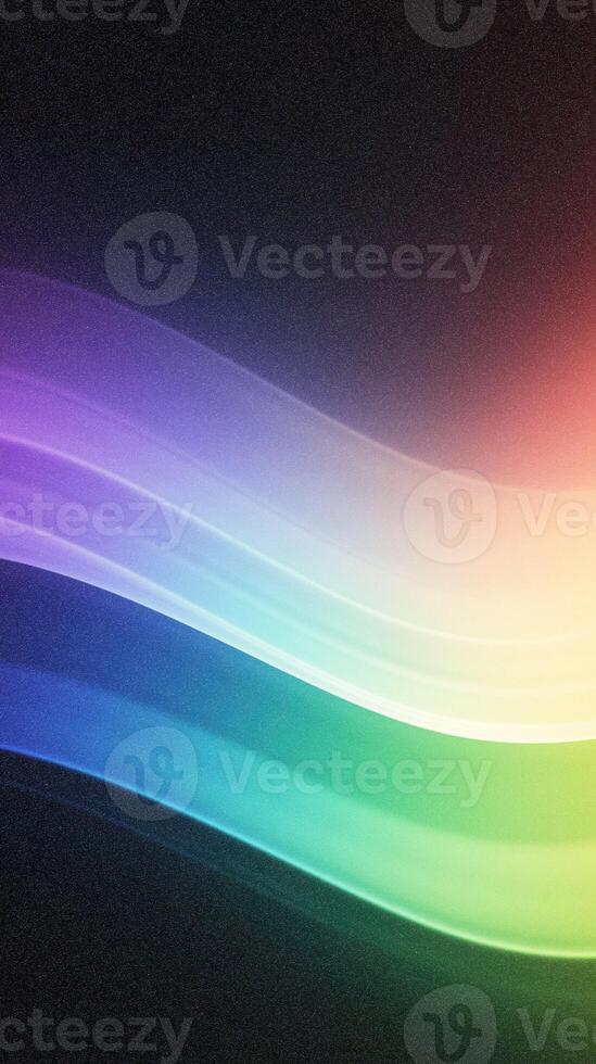 Colorful abstract waves of light in gradient spectrum on dark background photo