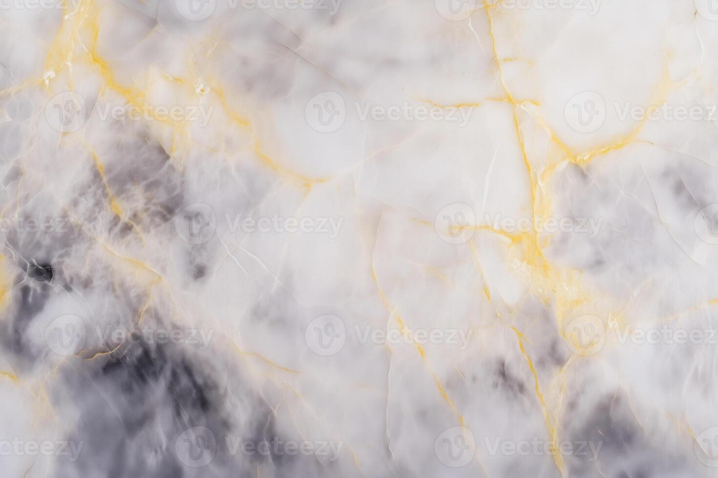 A close up of a marble wall with gold and white paint photo