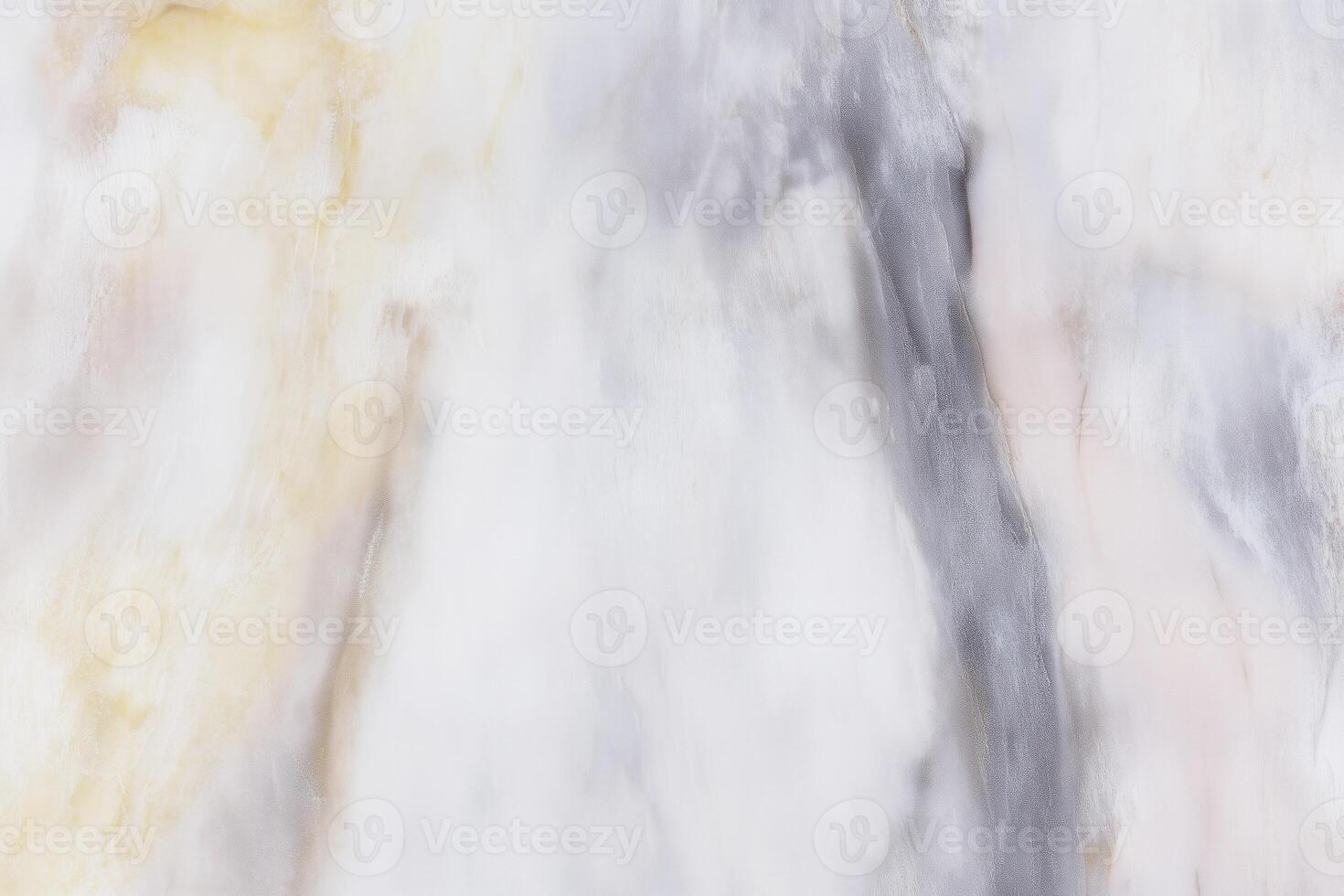 Smooth marble surface with subtle gray and yellow veining photo