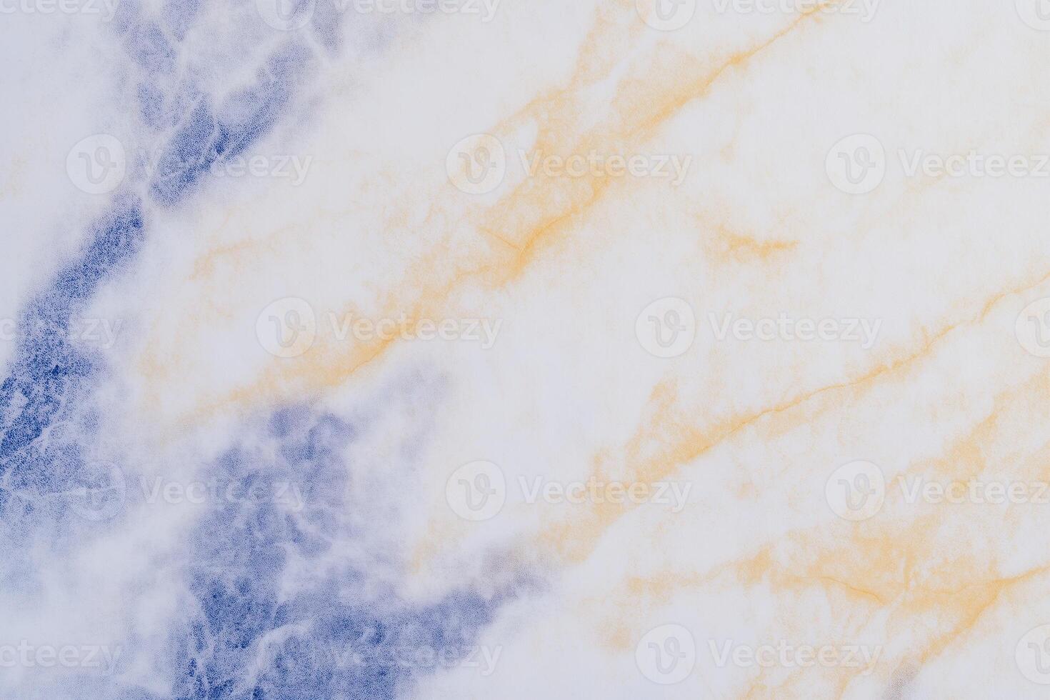 Abstract blue and orange marble texture with subtle vein patterns photo