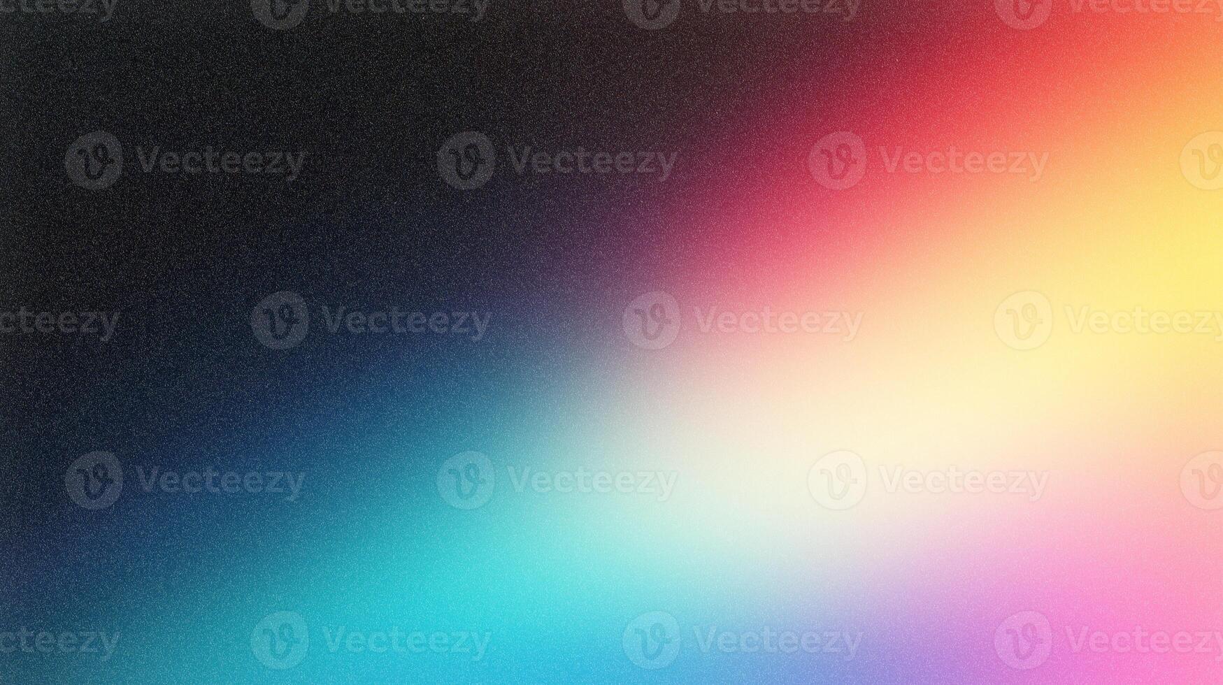 Colorful gradient background blending black, blue, pink, and yellow photo