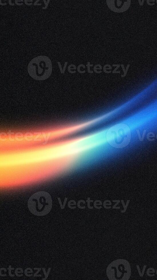 Colorful light streak on black background with radiant gradient effect photo