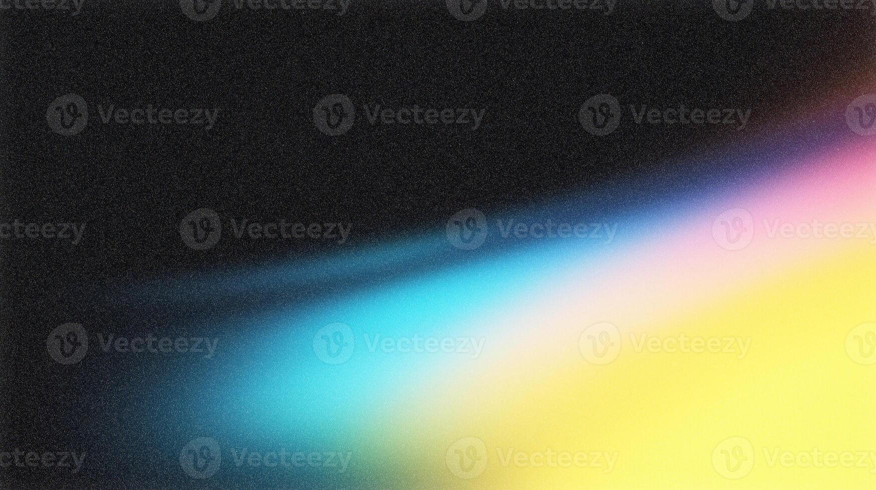 Vibrant diagonal gradient fading from black to yellow with blue and pink hues photo