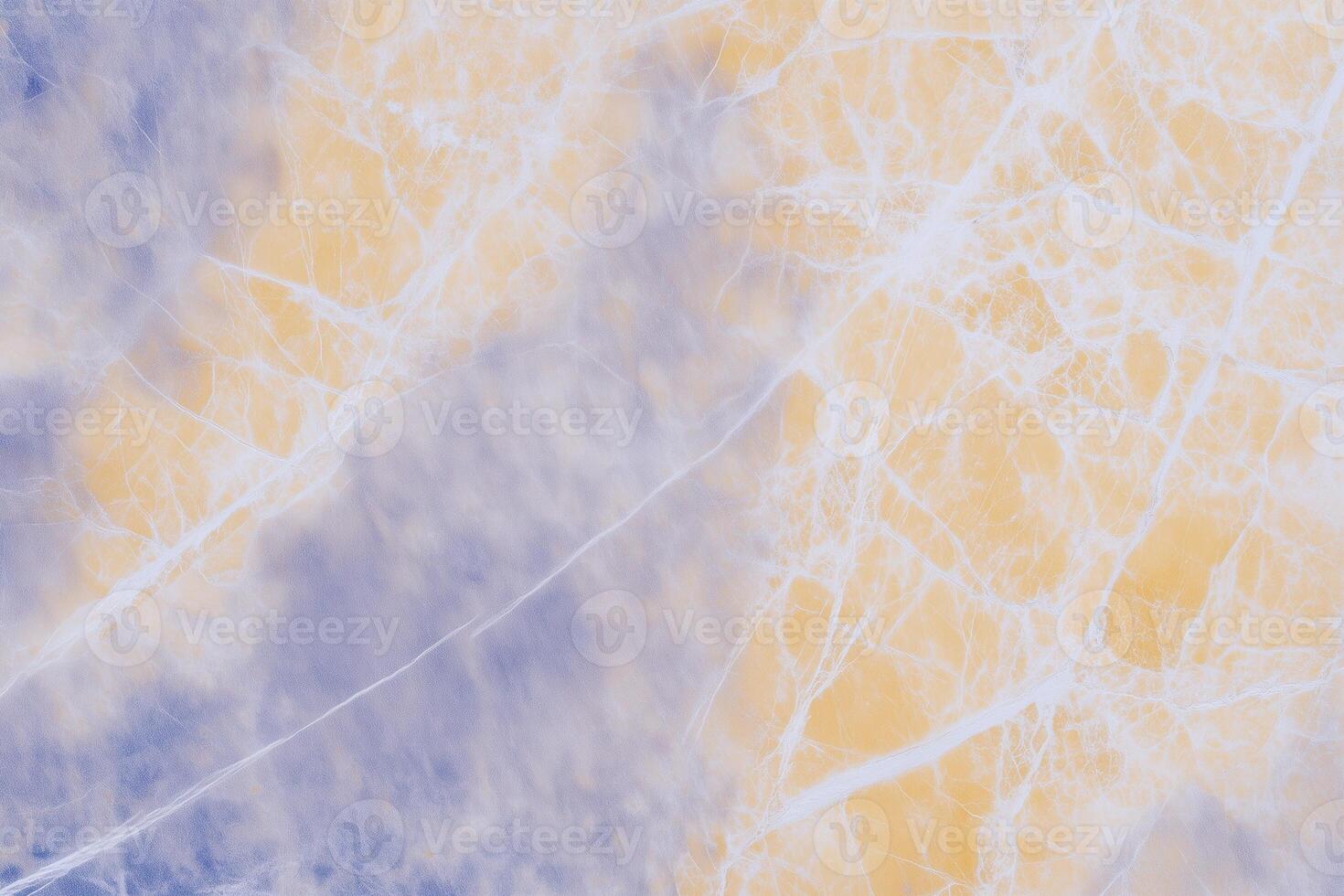 Abstract pattern of blue and yellow marble texture with white veins photo