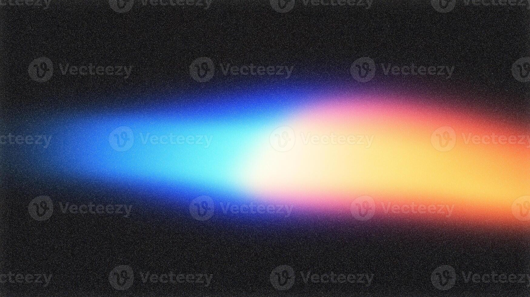 Light beam illuminating dark background creating colorful gradient effect photo