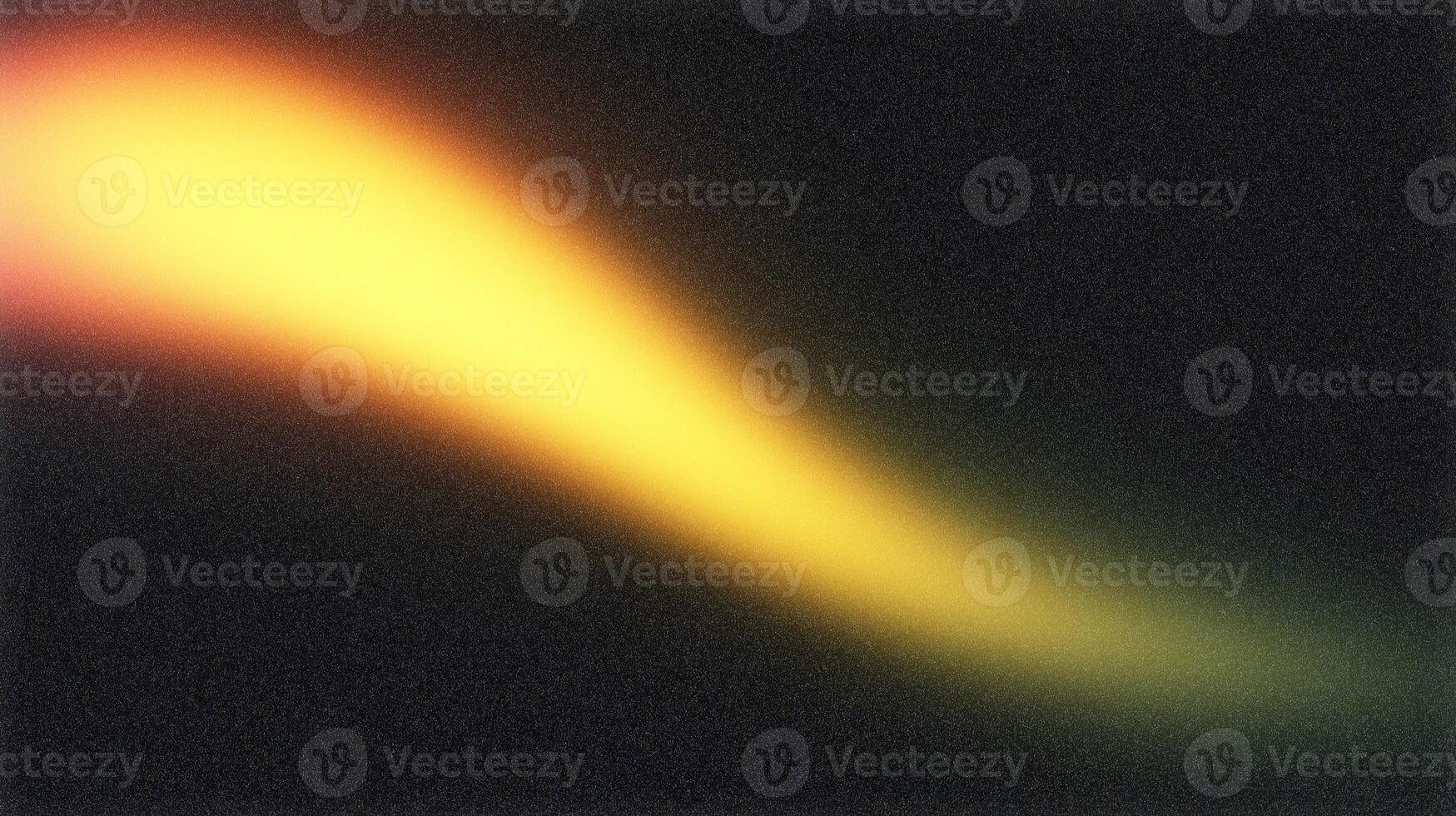 Light leak creating abstract golden light on dark background photo