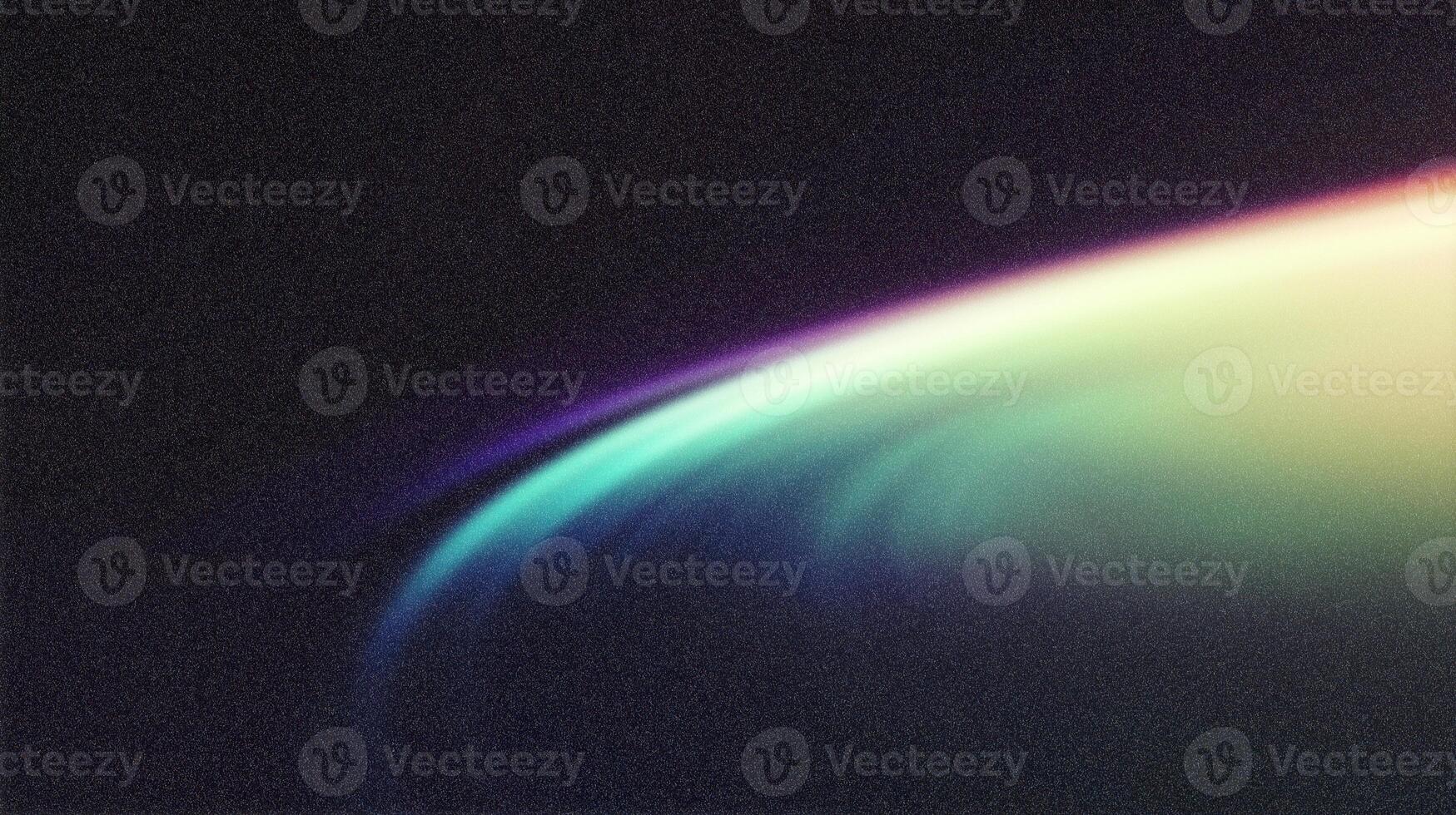 Colorful atmospheric glow illuminating earth's horizon from space with visible stars photo