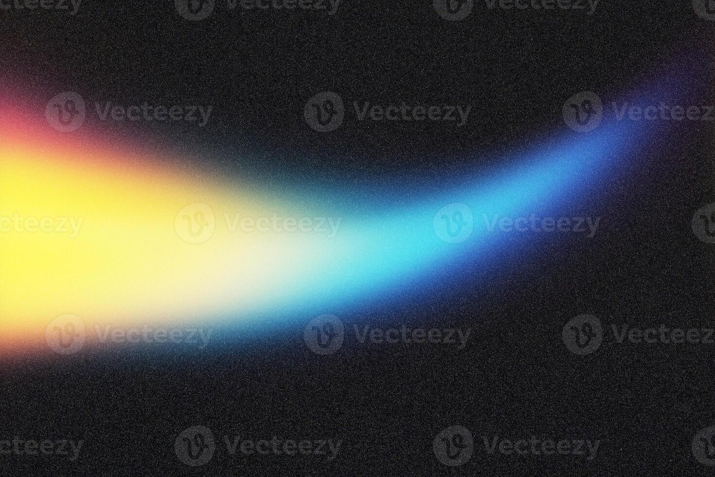 Light trails creating colorful abstract design on dark background photo