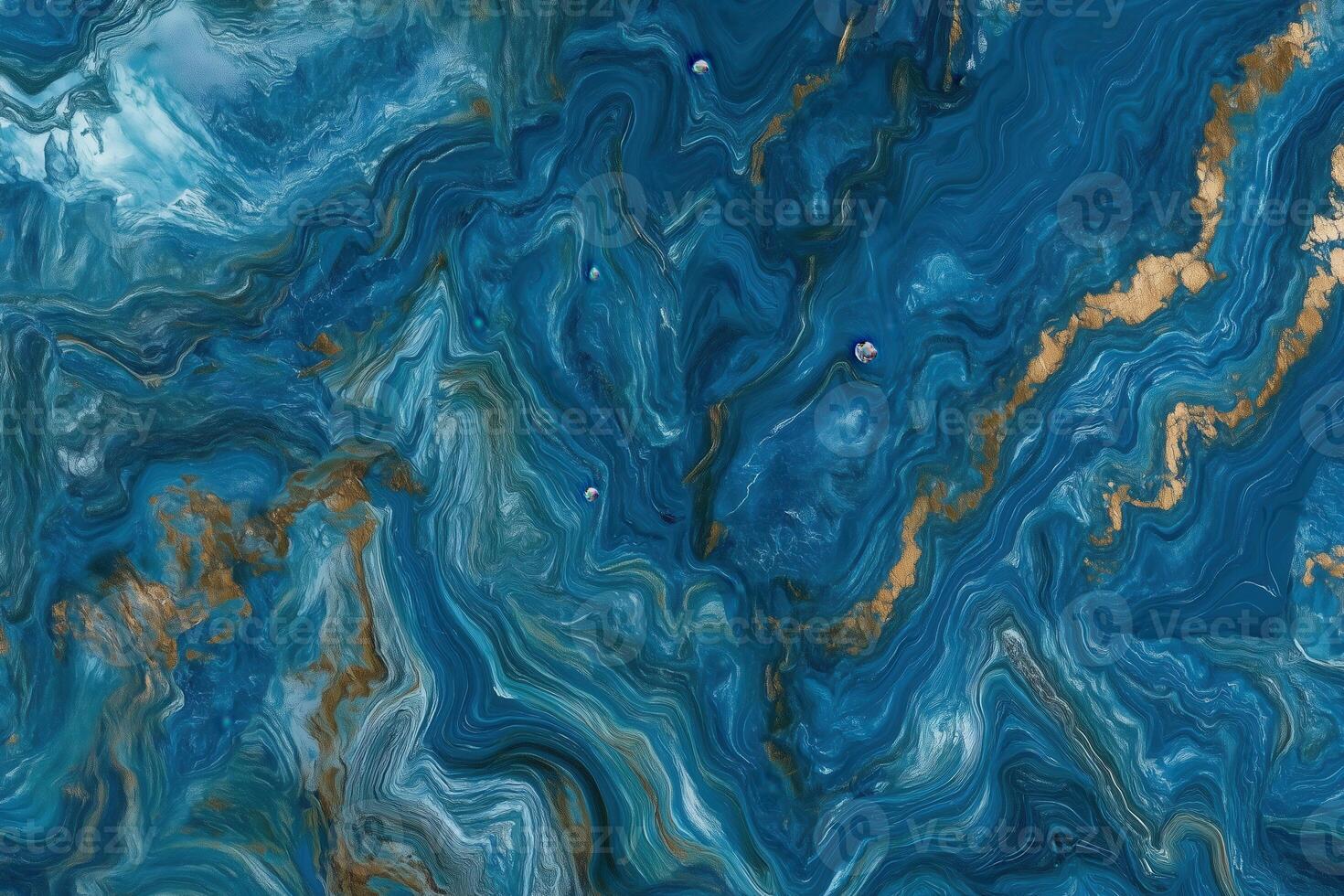 Abstract blue and gold marble texture with swirling patterns and intricate details photo