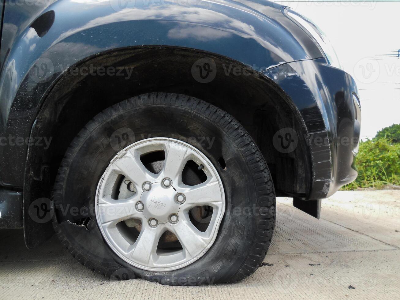 A close up of a tire on a car photo