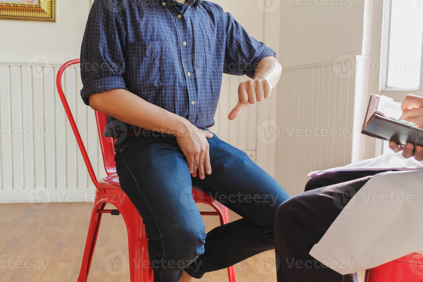 Man sitting on chair photo