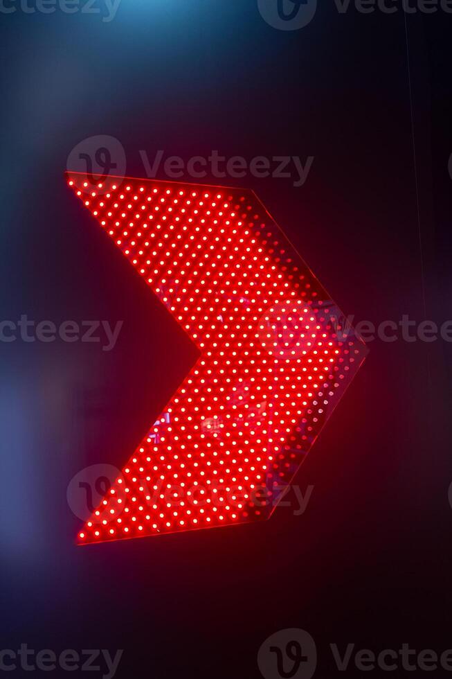 Red electronic handle of direction of movement close-up photo