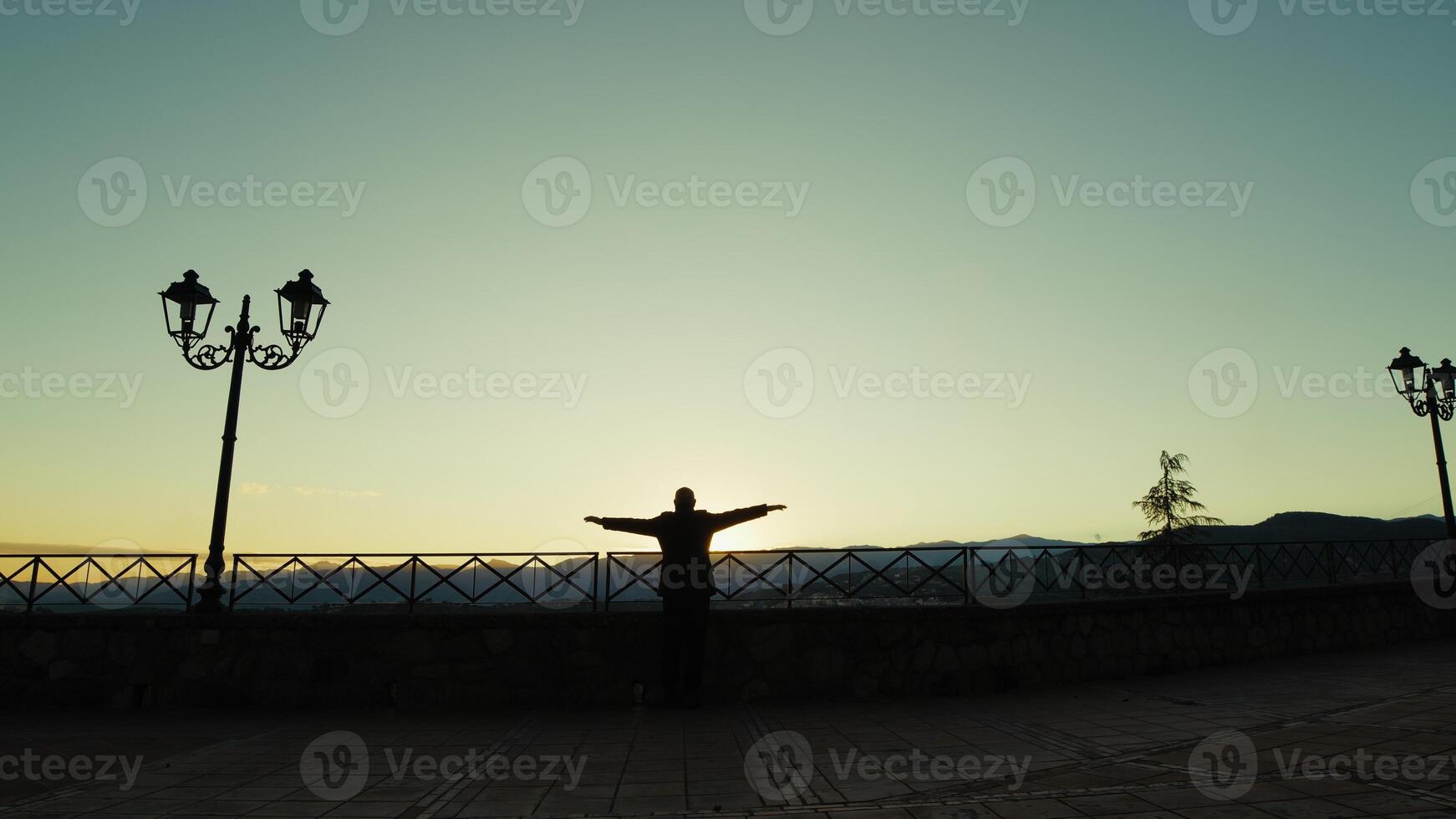 Silhouette Of An Elderly Man Runs Happy With Joy Towards A Wonderful Sunset Sky Outdoor photo