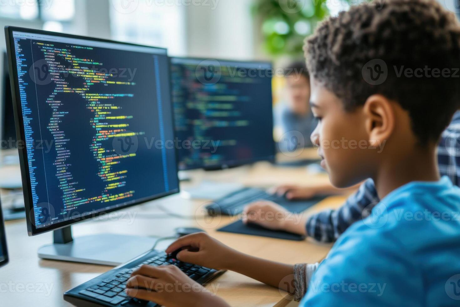 Students learn programming and coding skills in collaborative tech hub photo