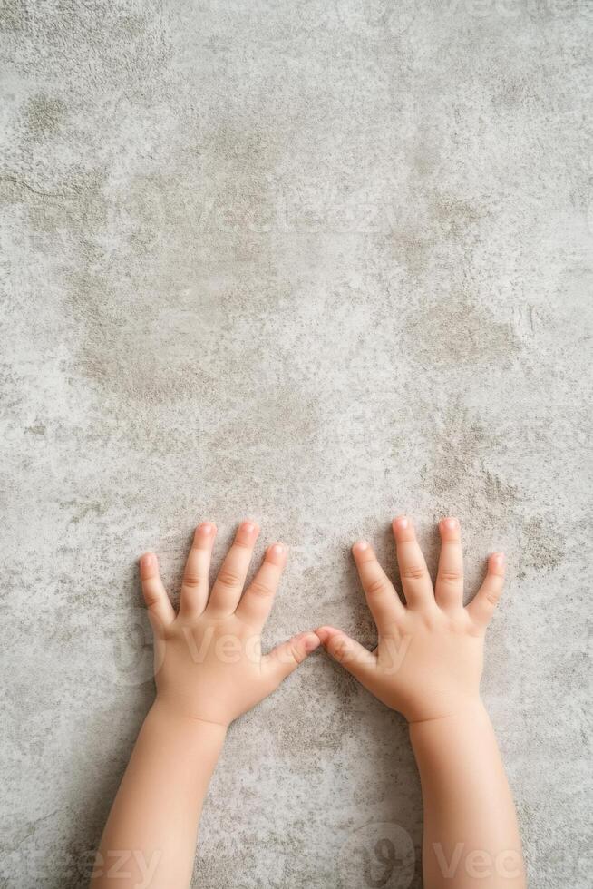 Childs hands pushing against an invisible barrier, expressing the need for boundaries and personal space in a playful moment photo