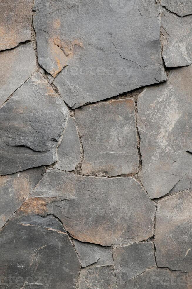 Exploring the rugged beauty of a rough mountainous surface that showcases the intricate layers of natures design photo