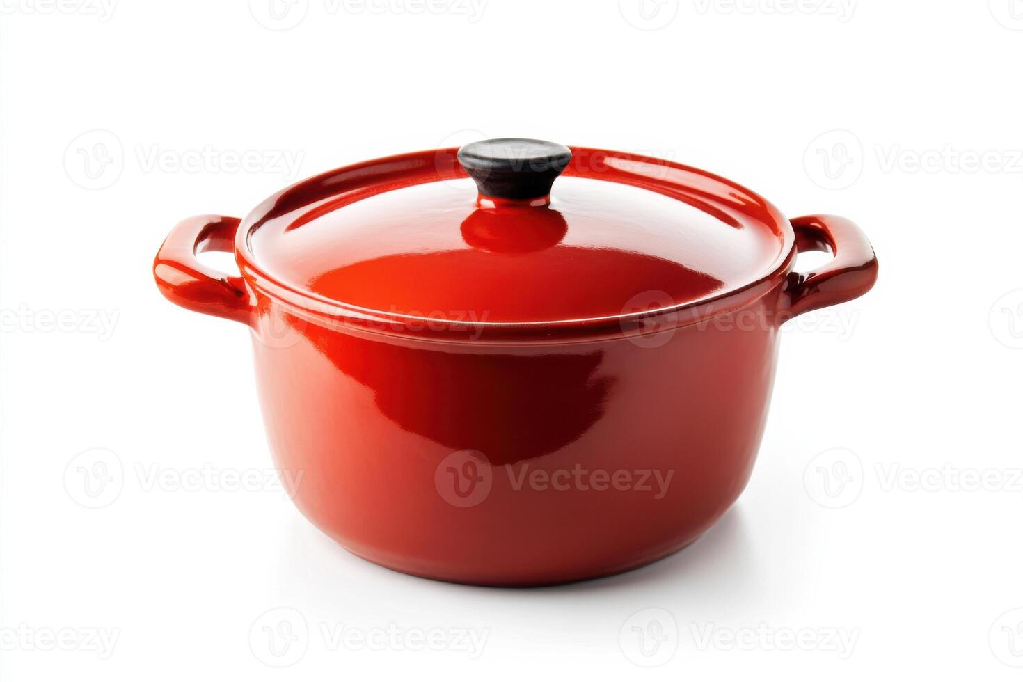 Red ceramic hot pot on a clean white background showcasing elegant design and vibrant color photo
