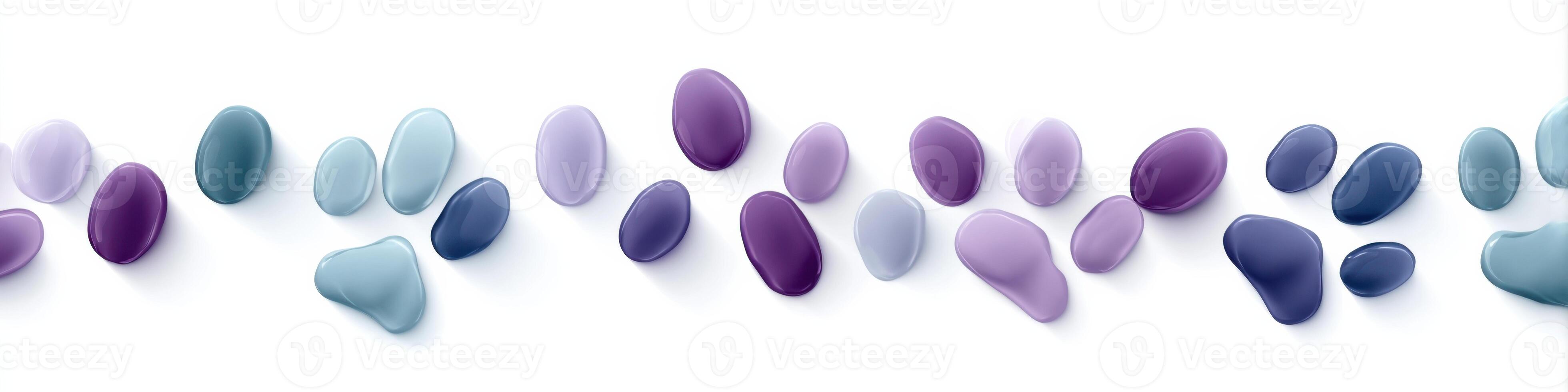 Colorful glass paw prints create an imaginative design with empty space for text photo