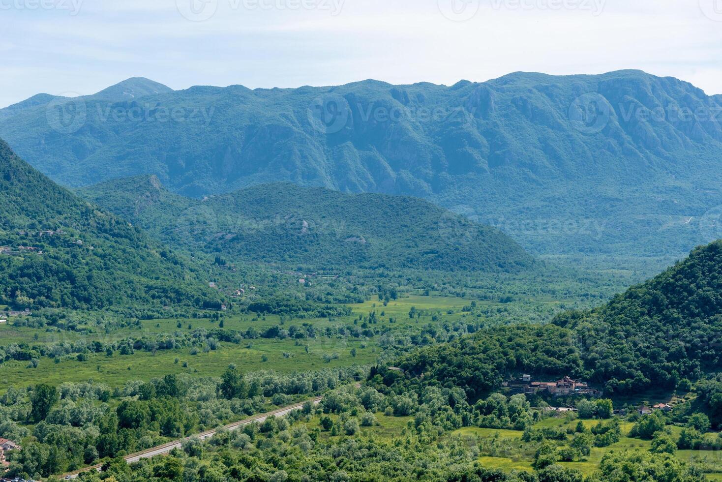 Landscape of Montenegro mountains, mountain outside range in haze summer photo