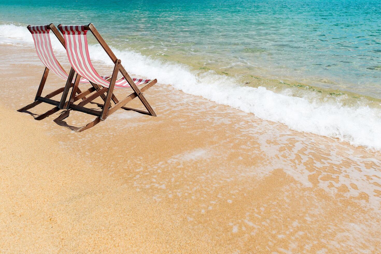 Beautiful chair around beach sea ocean for travel vacation photo