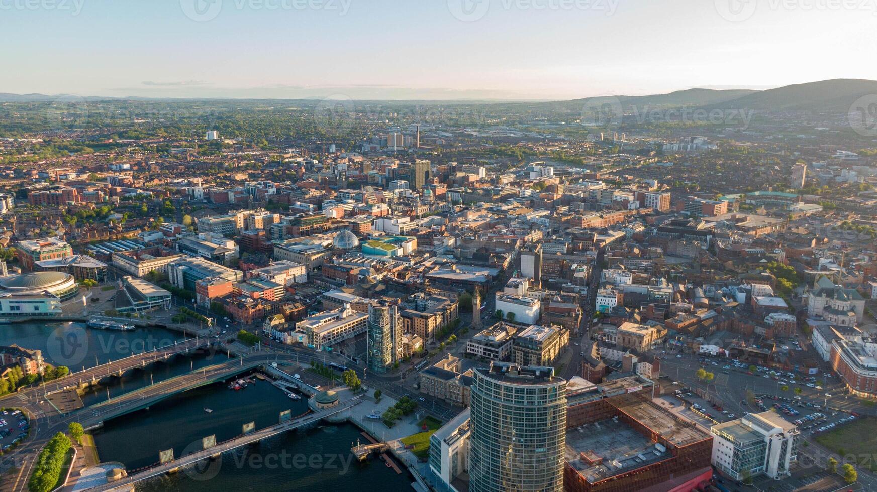 Aerial view on Lagan River and buildings in City centre of Belfast Northern Ireland. Drone photo, high view of town photo