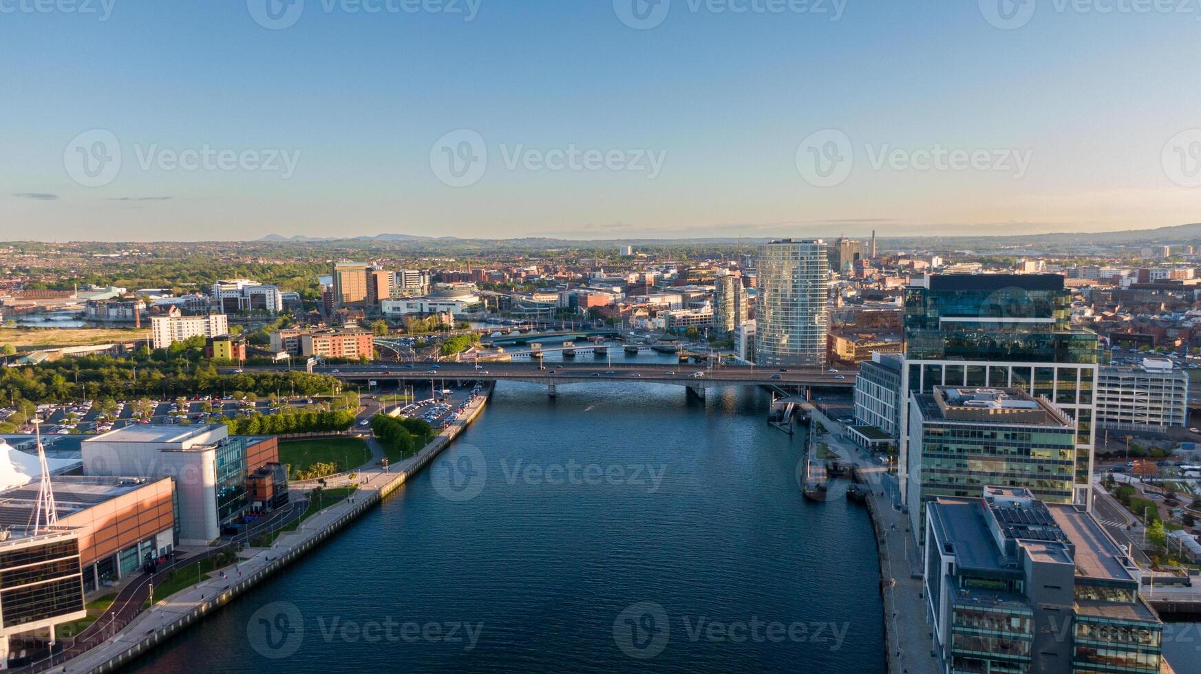 Aerial view on Lagan River and buildings in City centre of Belfast Northern Ireland. Drone photo, high angle view of city photo