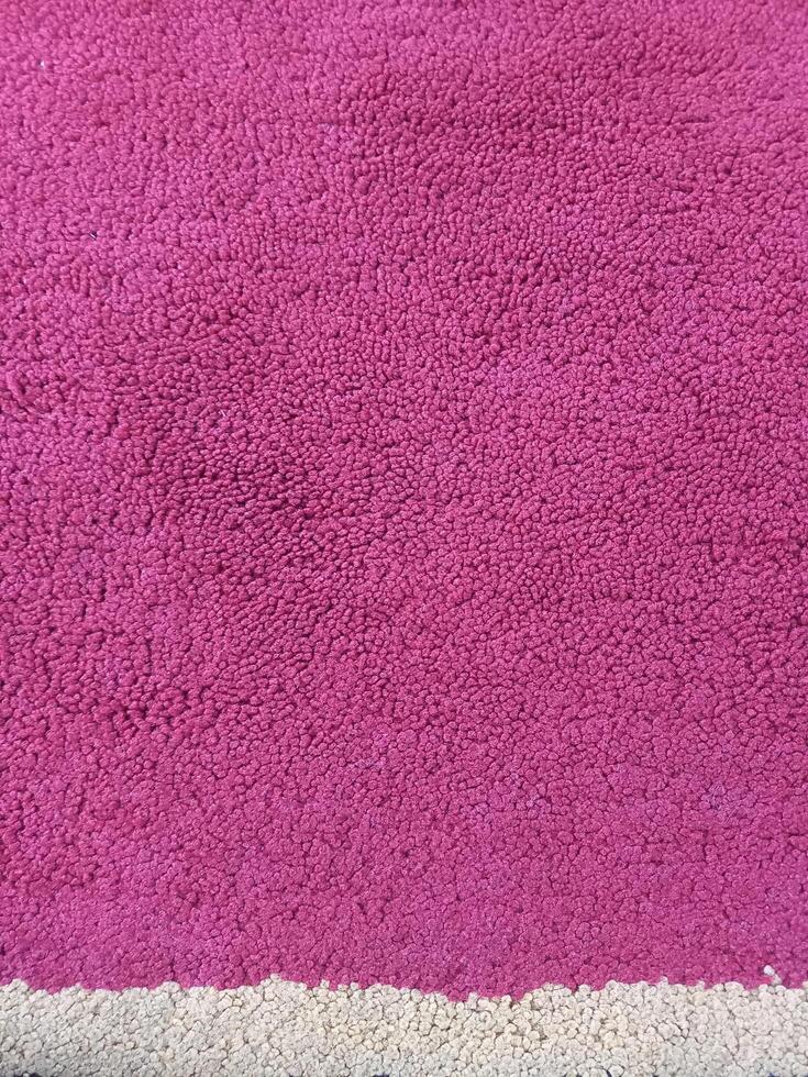 clean and beautiful red carpet inside a building photo
