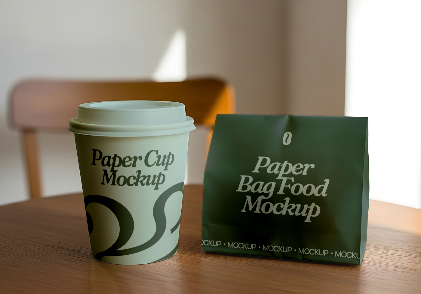 A paper cup and a paper food bag mockup sit on a wooden table psd