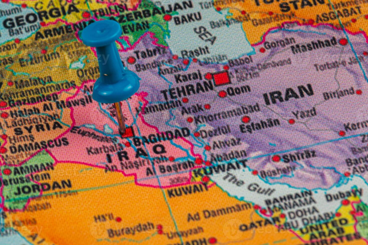 Map highlighting Iraq with pushpin indicating location photo