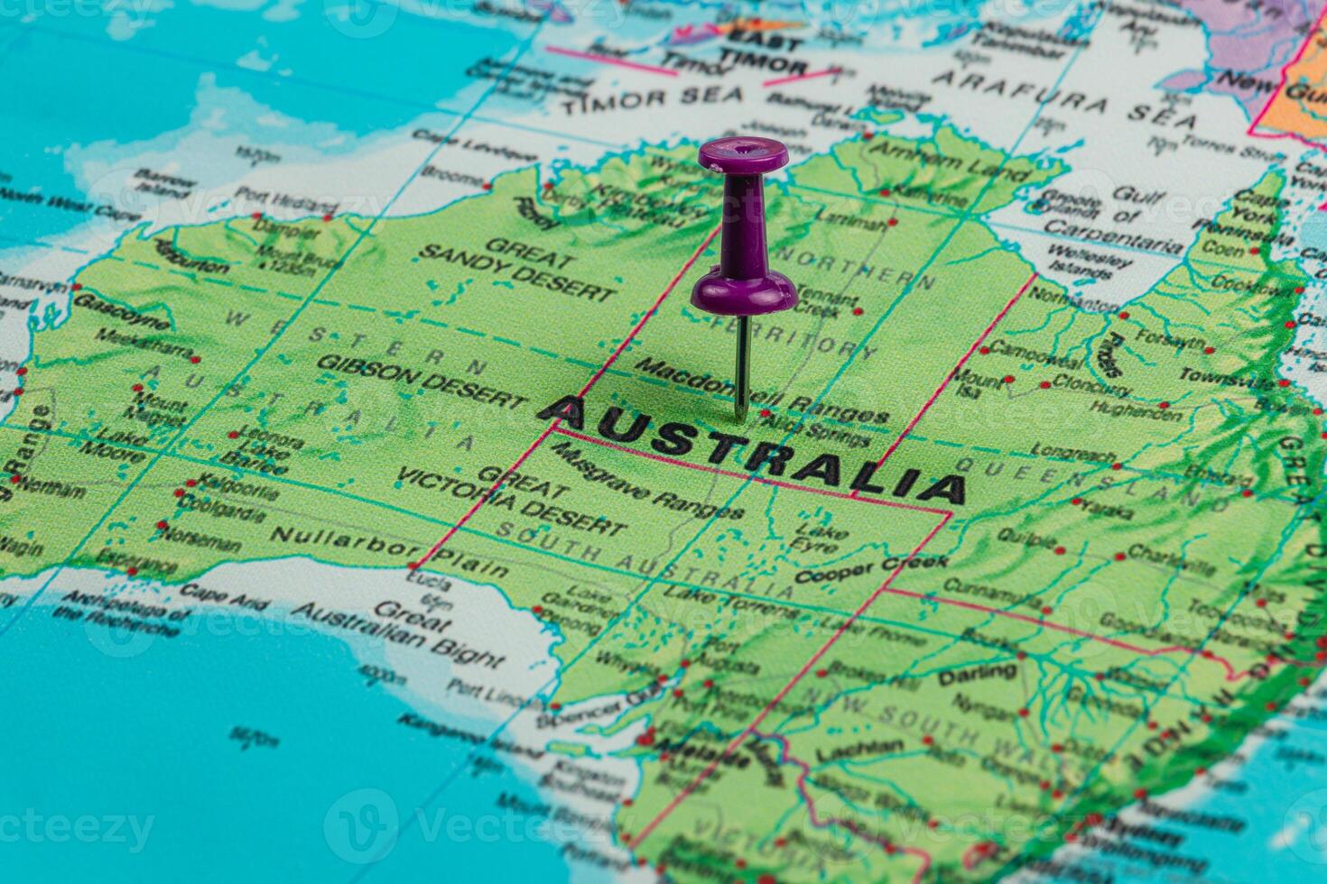 Map of Australia with a pin marking a specific location photo