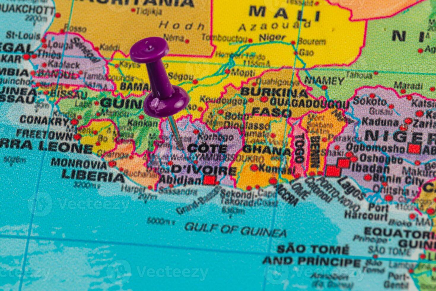 Pin marks location on a map of West Africa in colorful detail photo