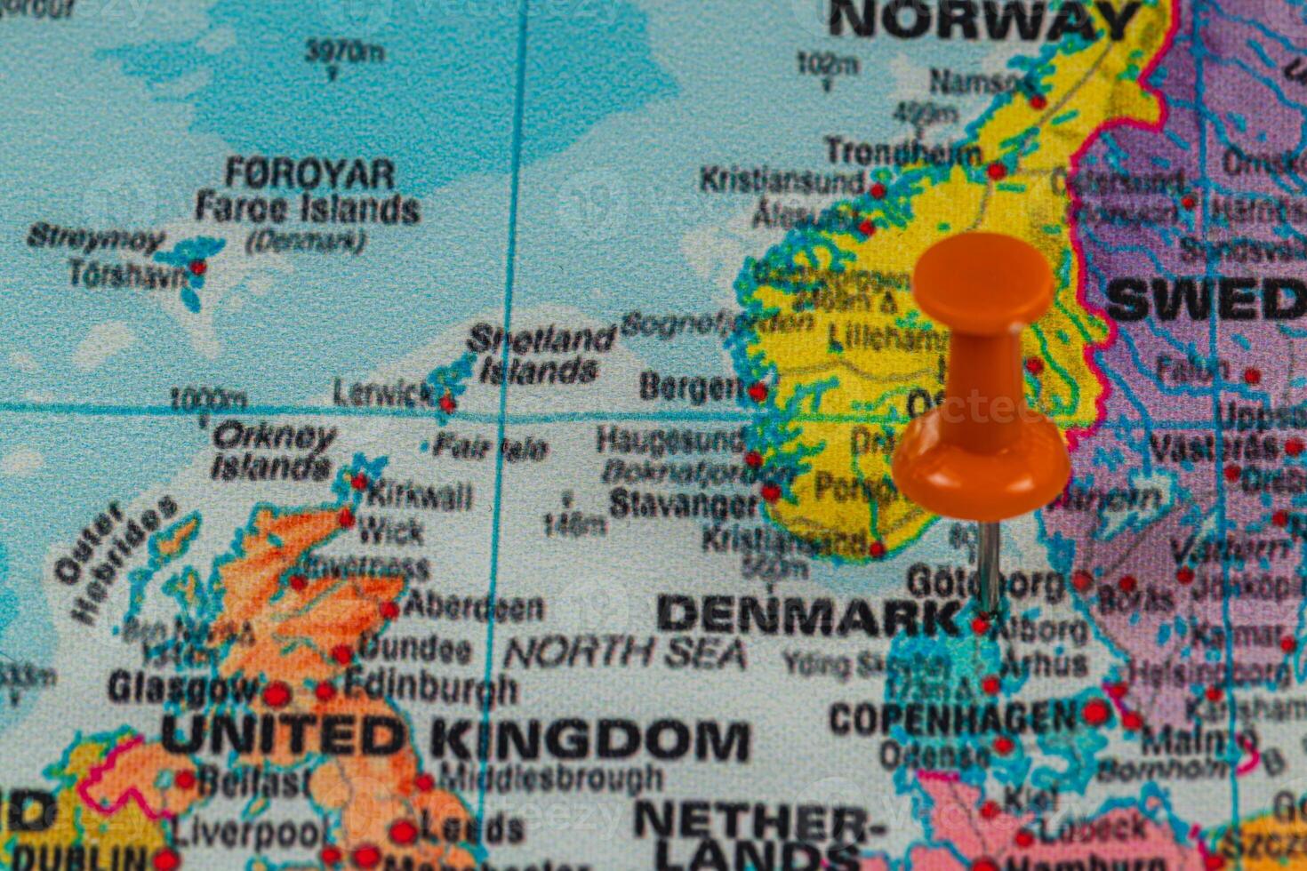 Map highlighting Denmark with an orange pushpin near Sweden photo