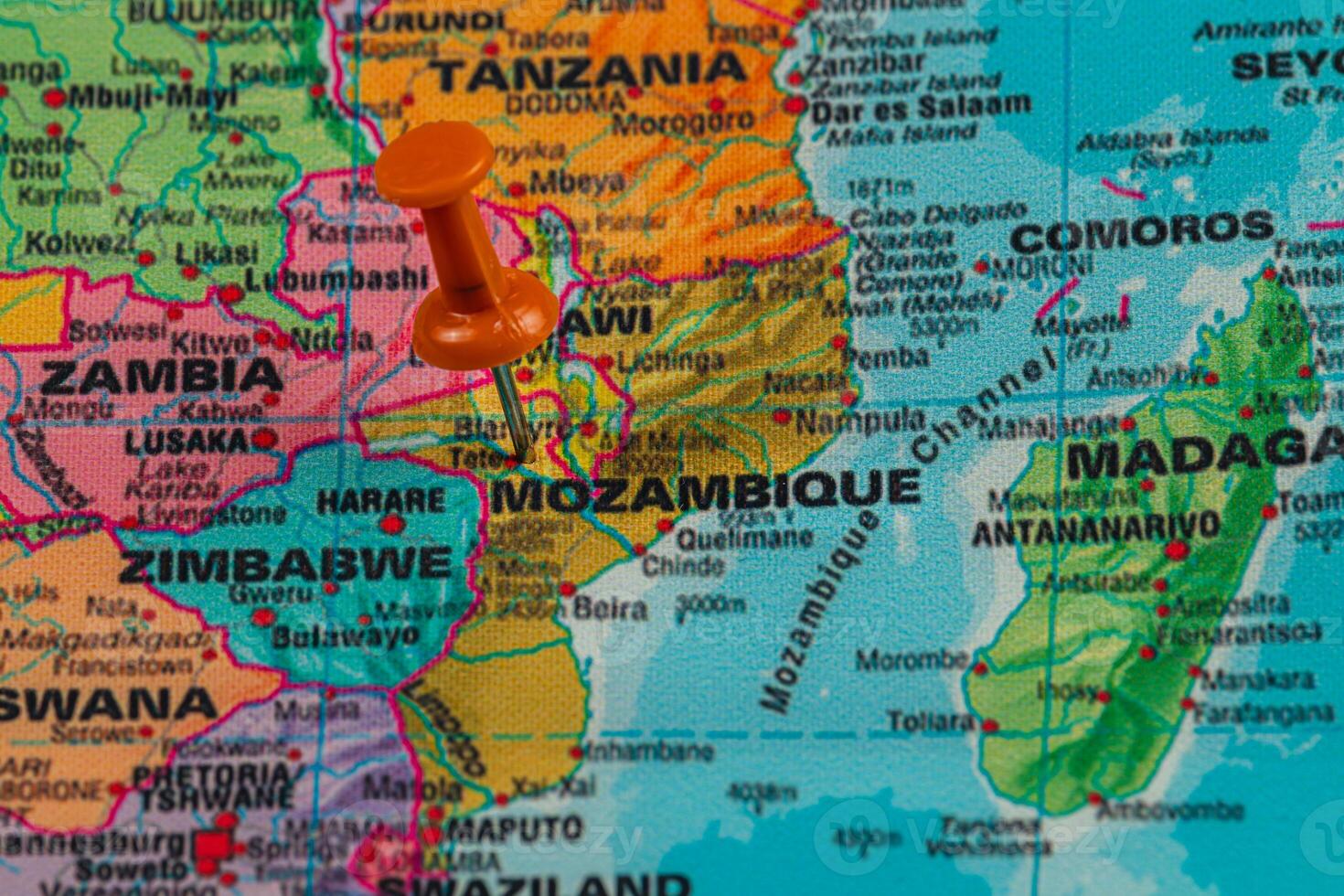 Pin marking location in Mozambique on a colorful map photo