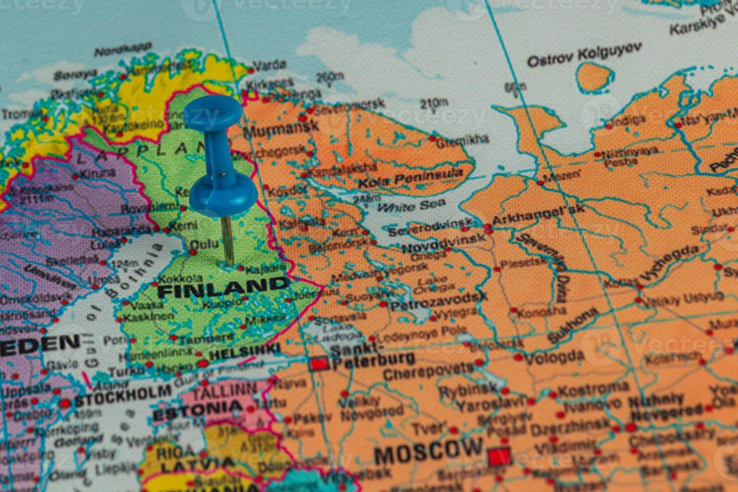 Pinpointing Finland on a colorful map of Europe photo