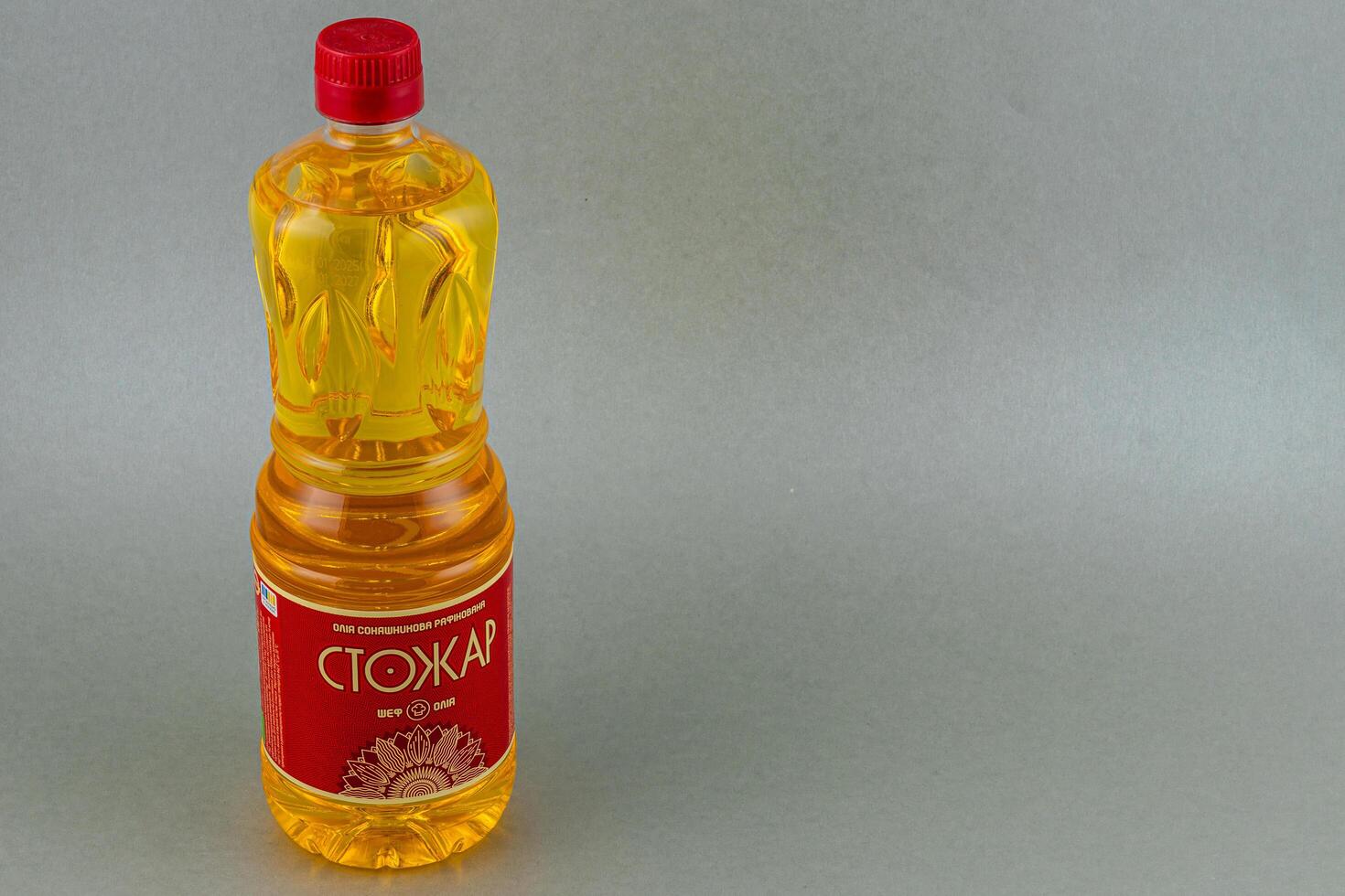 Lviv Ukraine 05.22.25 Cooking oil bottle on a neutral background photo