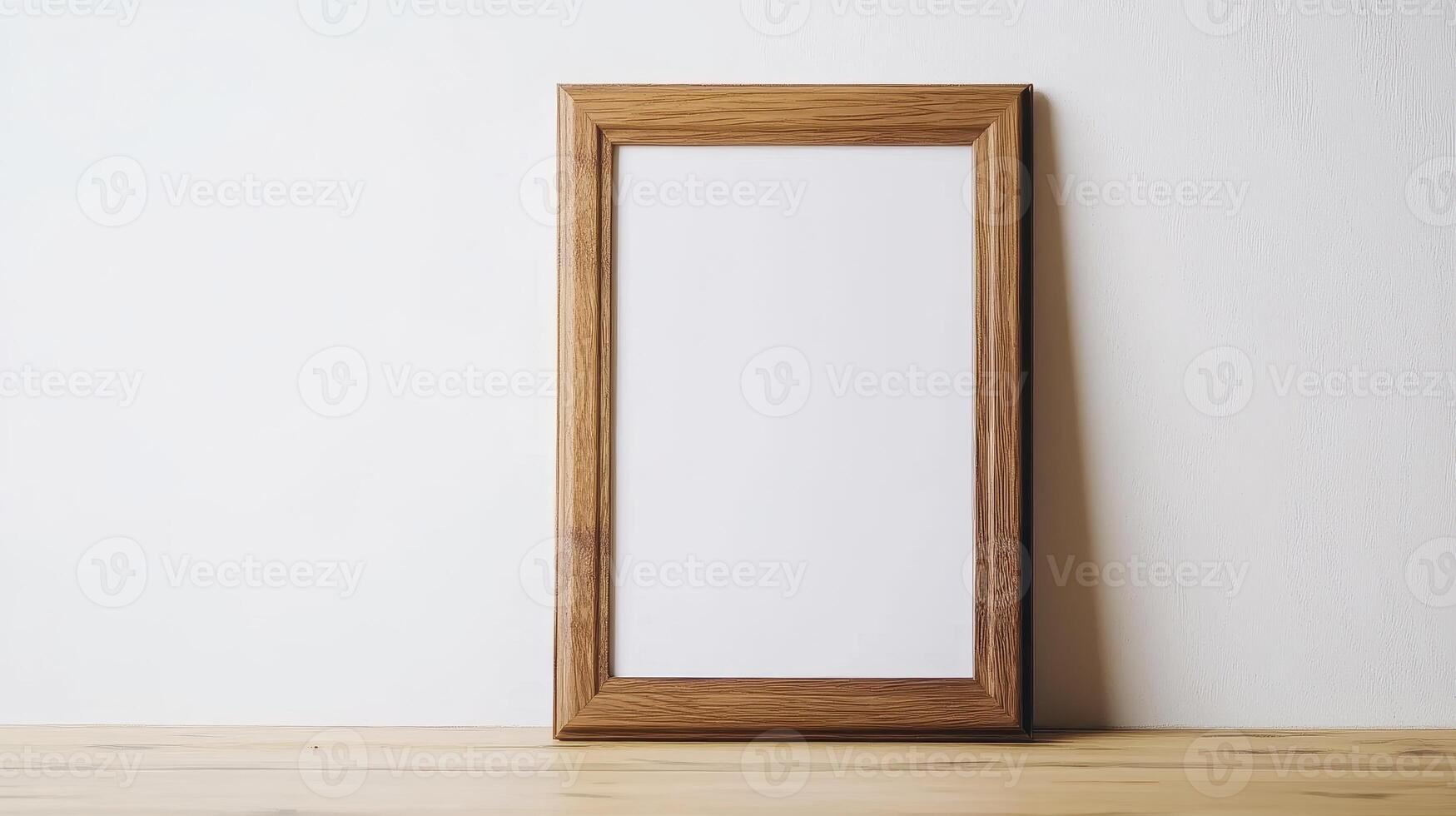 Wooden frame placed on a wooden surface against a white background for displaying artwork or photos