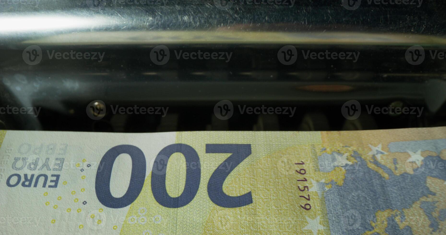 Euro banknotes during counting in the counting machine. The currency of the European Union. photo
