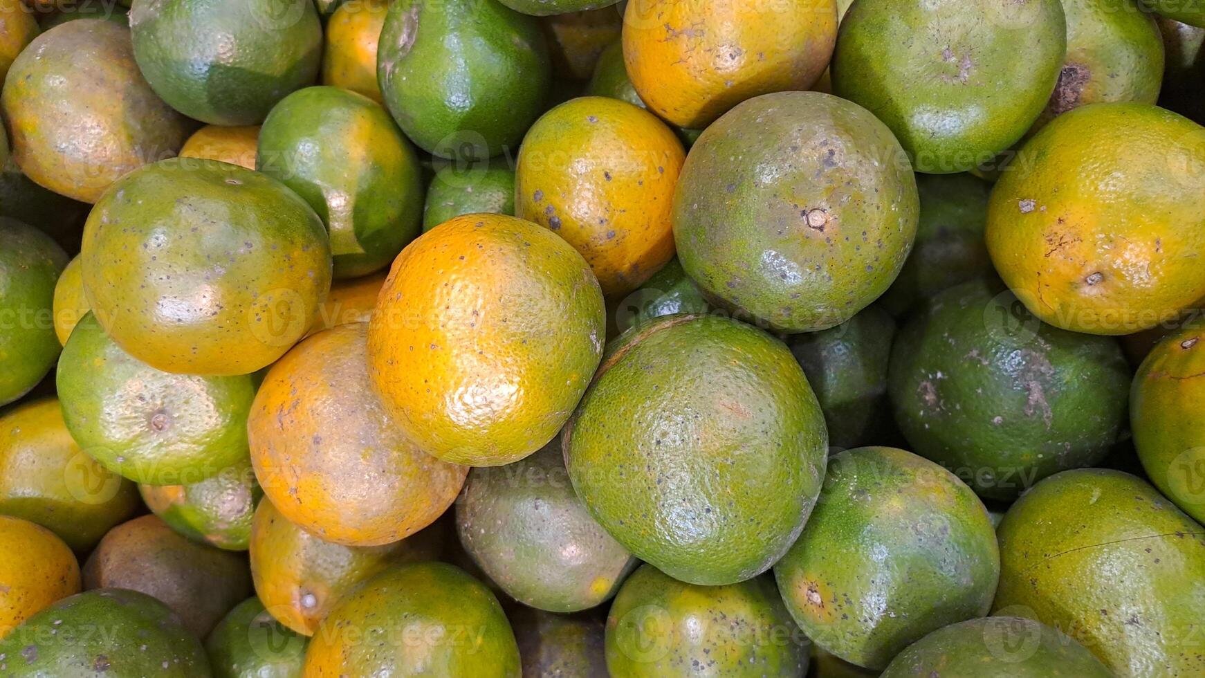 Fresh Mandarin Oranges Pile High Ripe Citrus Fruits Abundant Harvest Juicy Sweet Taste Vitamin C Healthy Eating Organic Produce Market Stall photo