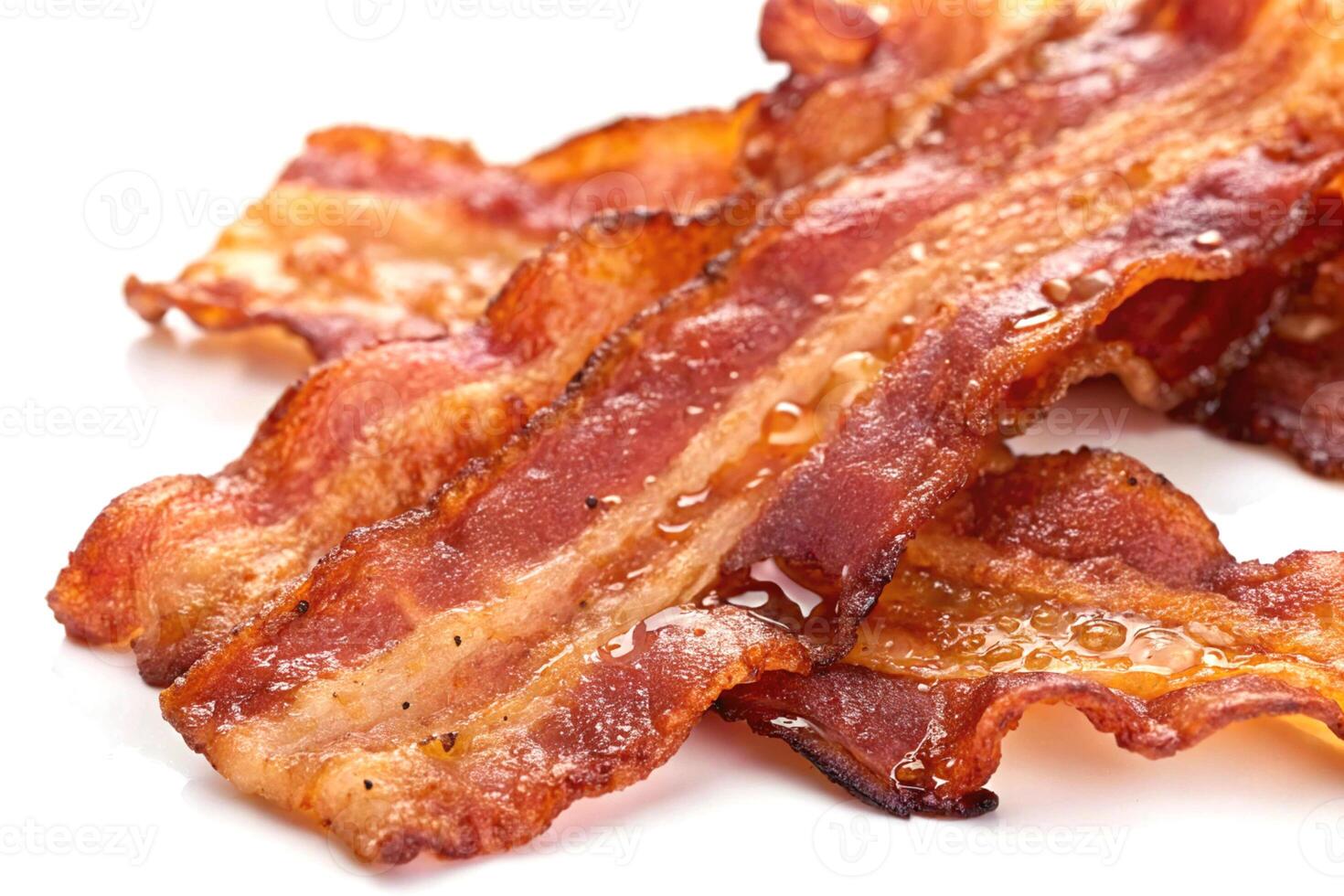 Closeup of crispy cooked bacon strips with rendered fat photo