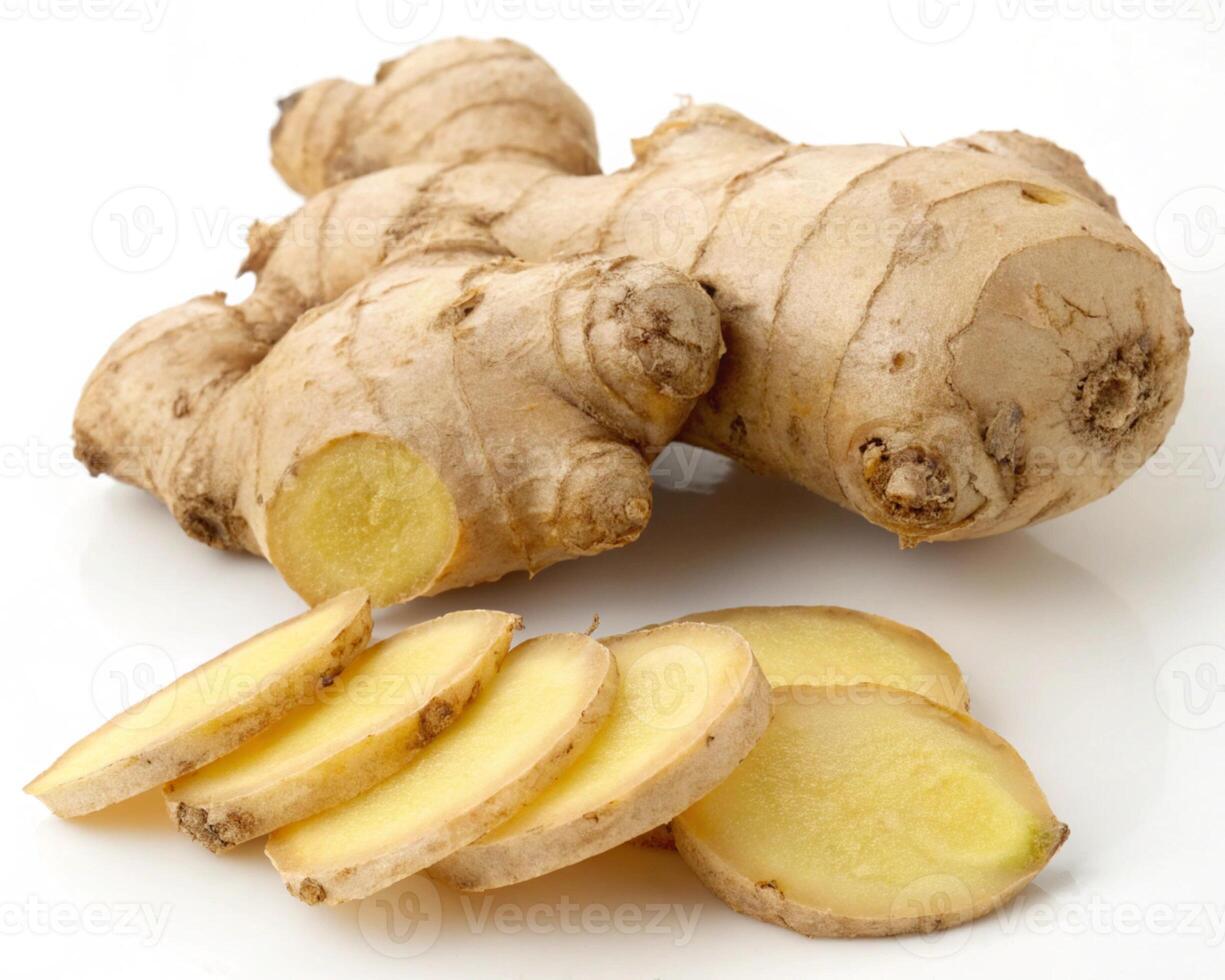 Fresh ginger root and slices isolated on white background photo