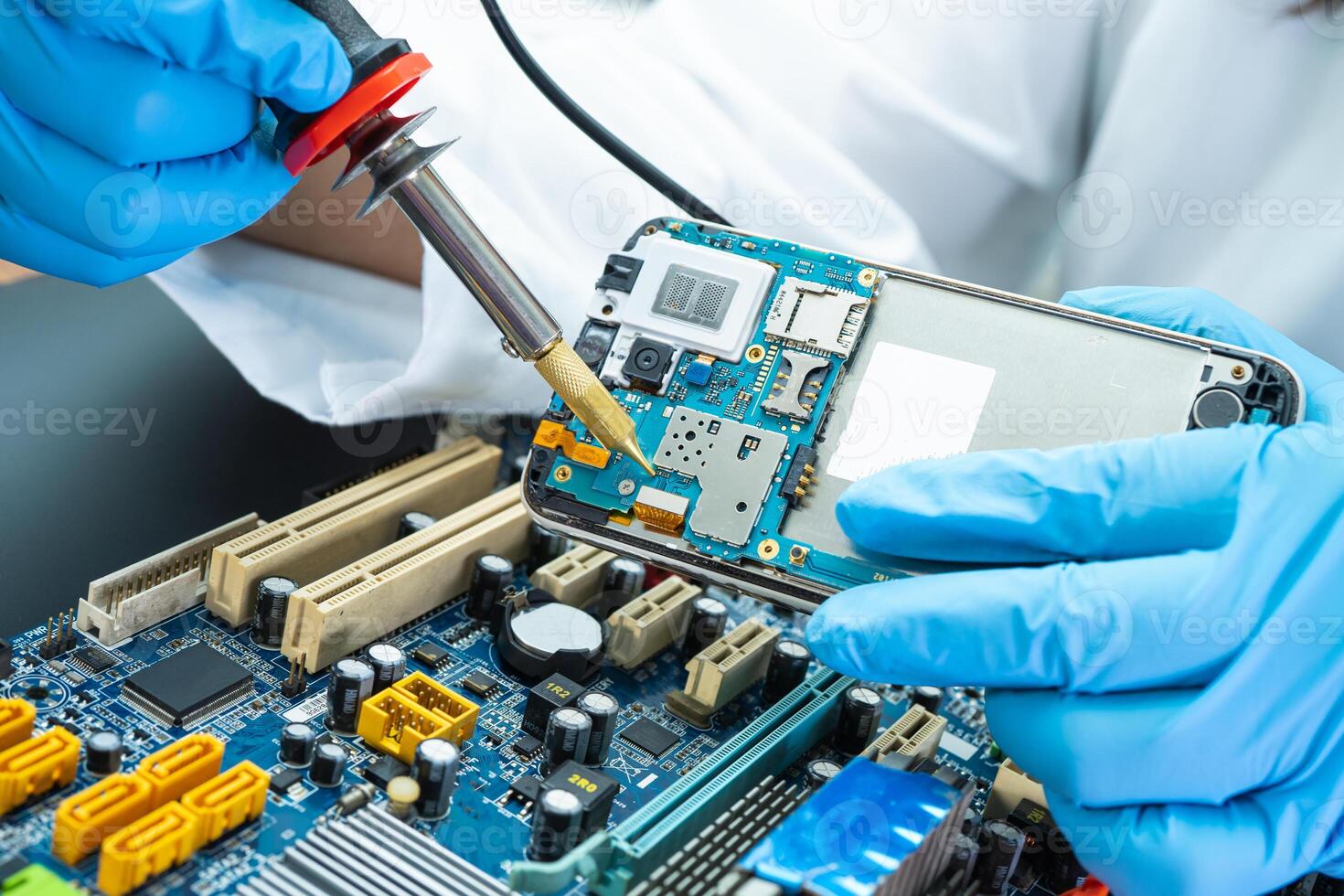 technician repairing inside of hard disk by soldering iron. Integrated Circuit. the concept of data, hardware, technician photo