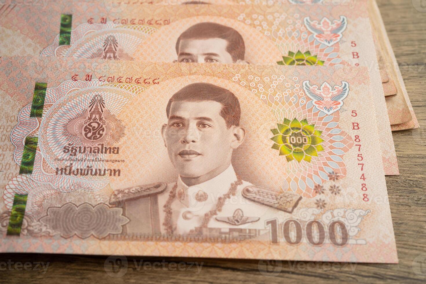 Thai baht banknotes business saving finance investment concept. photo