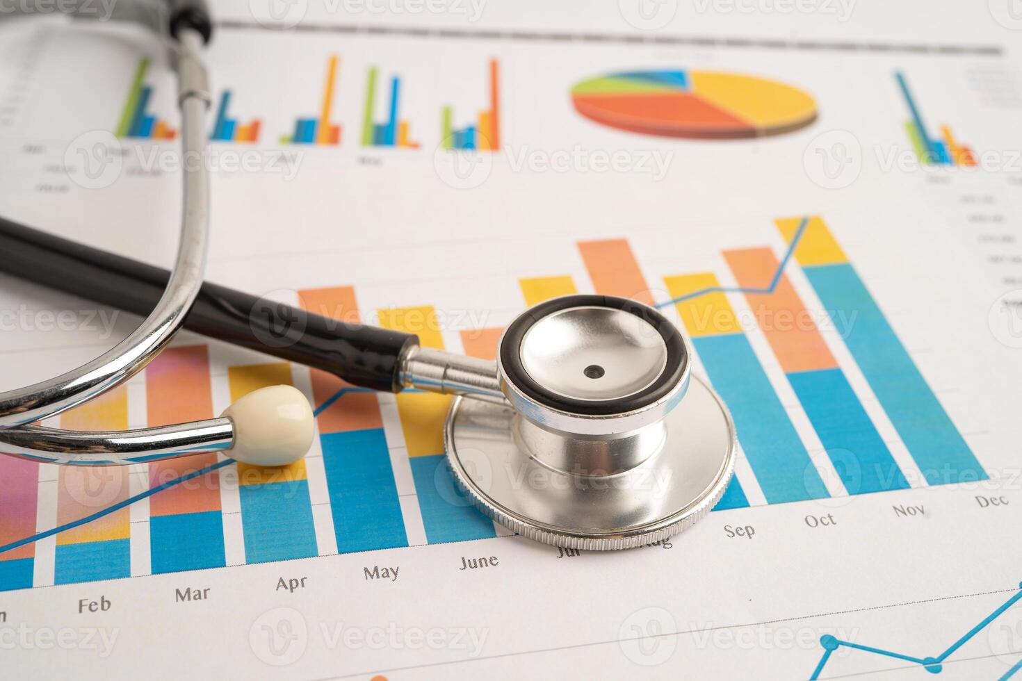 Stethoscope on spreadsheet and graph paper, Finance, Account, Statistics, Investment Analytic data photo
