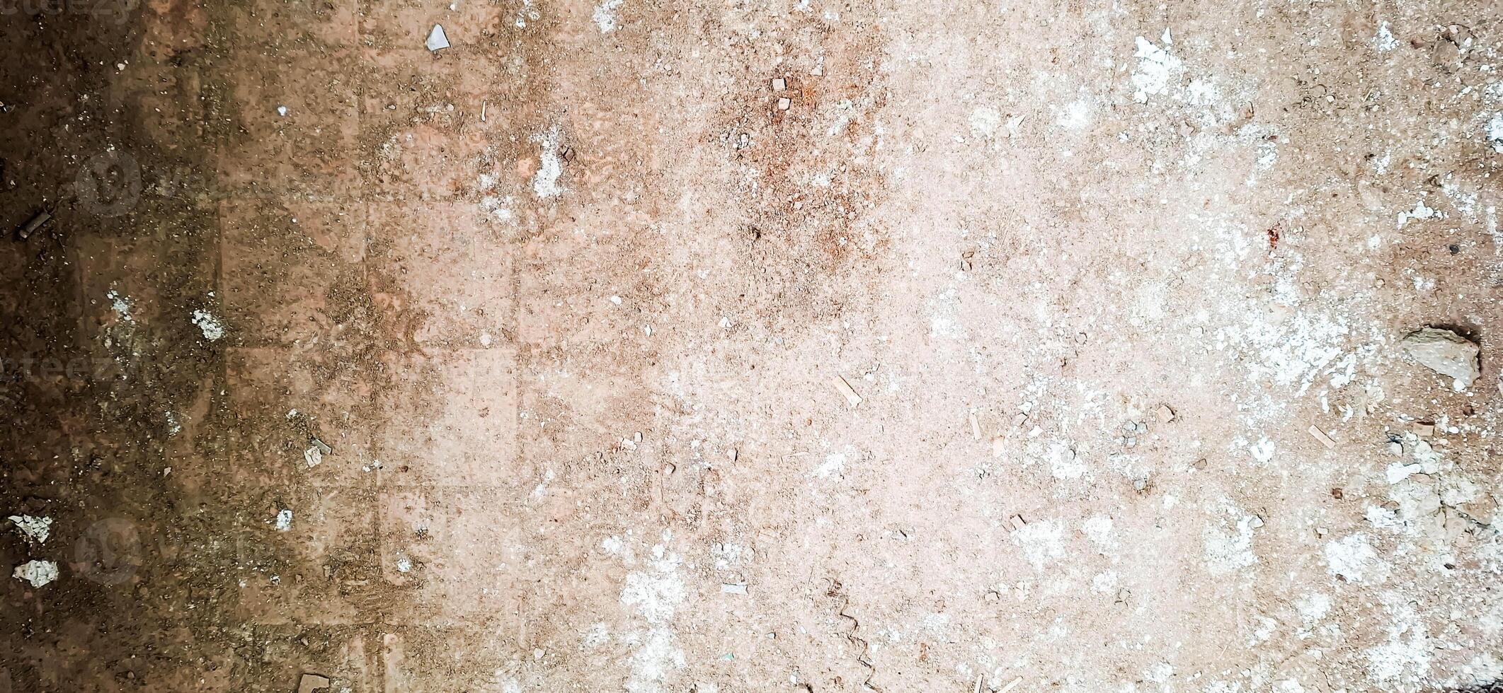 The floor texture of a collapsing building. Sand, cement, garbage.8 photo