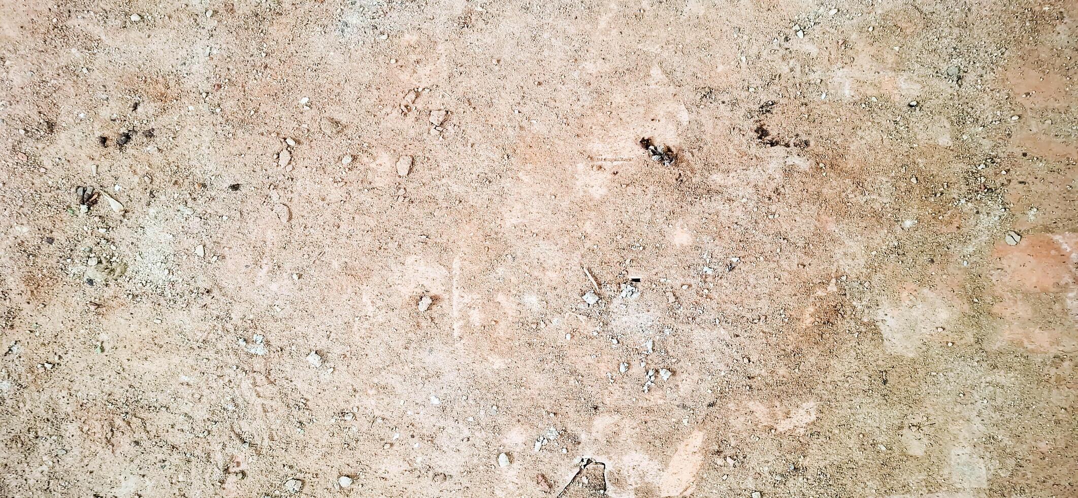 The floor texture of a collapsing building. Sand, cement, garbage.6 photo