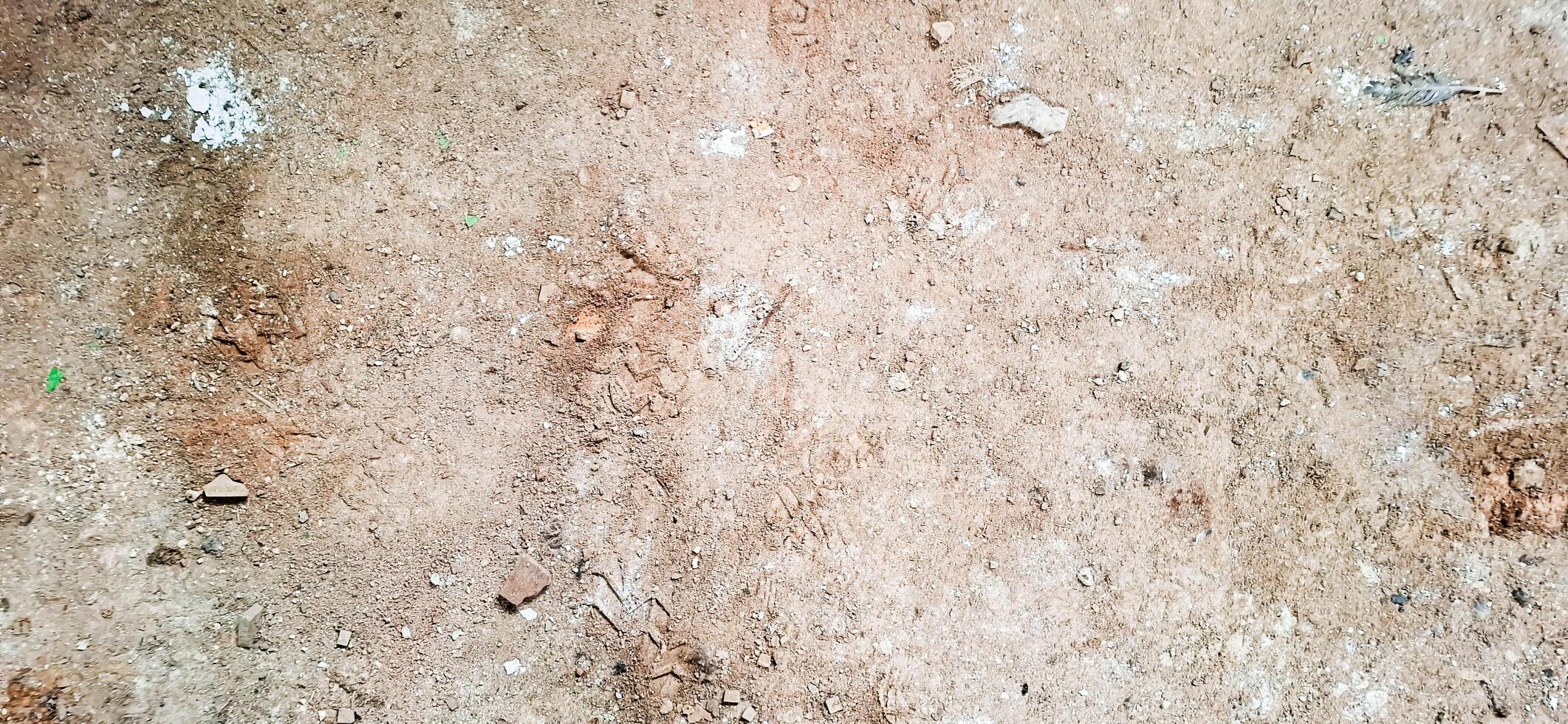 The floor texture of a collapsing building. Sand, cement, garbage.7 photo