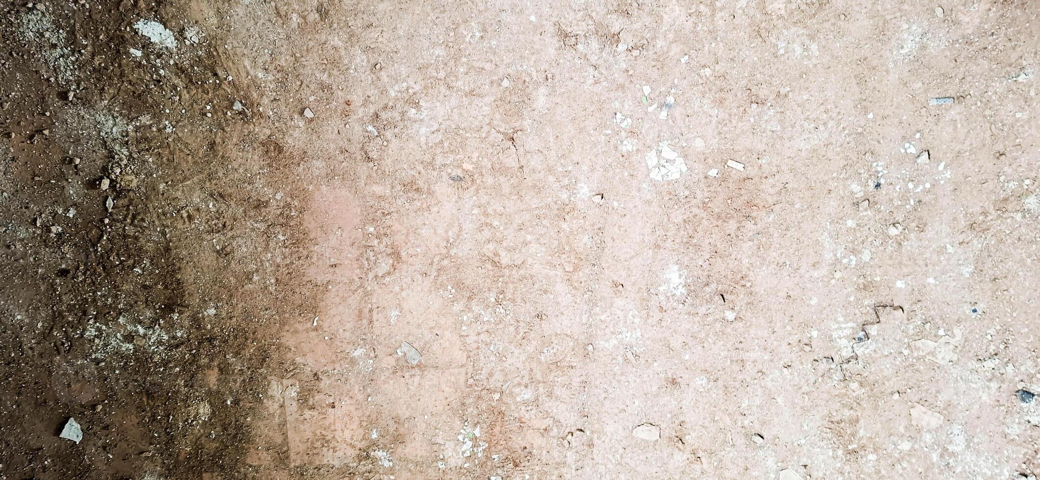 The floor texture of a collapsing building. Sand, cement, garbage.5 photo