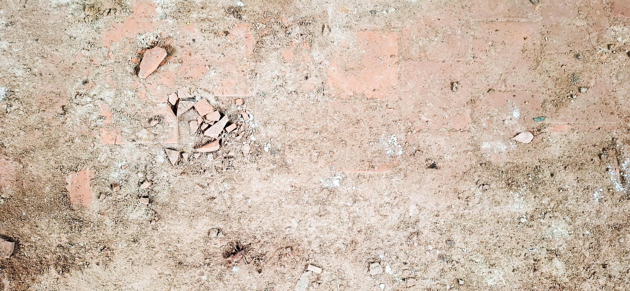 The floor texture of a collapsing building. Sand, cement, garbage.3 photo