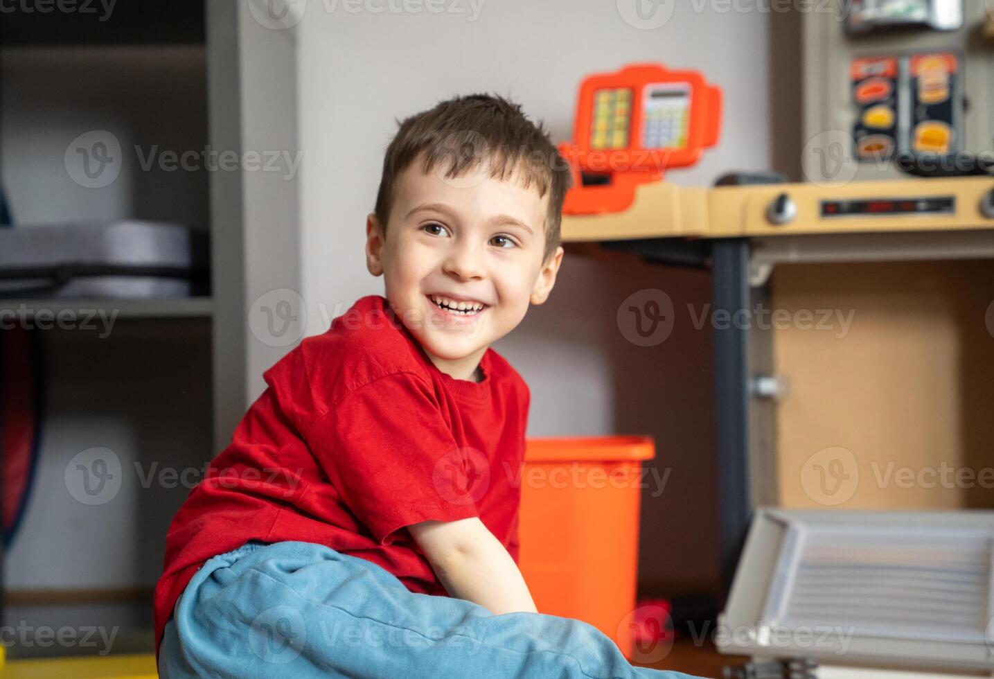 A little boy is walking on the floor in a room at home. Home life, and everyday childhood. Curiosity, and innocence in a cozy domestic setting. photo