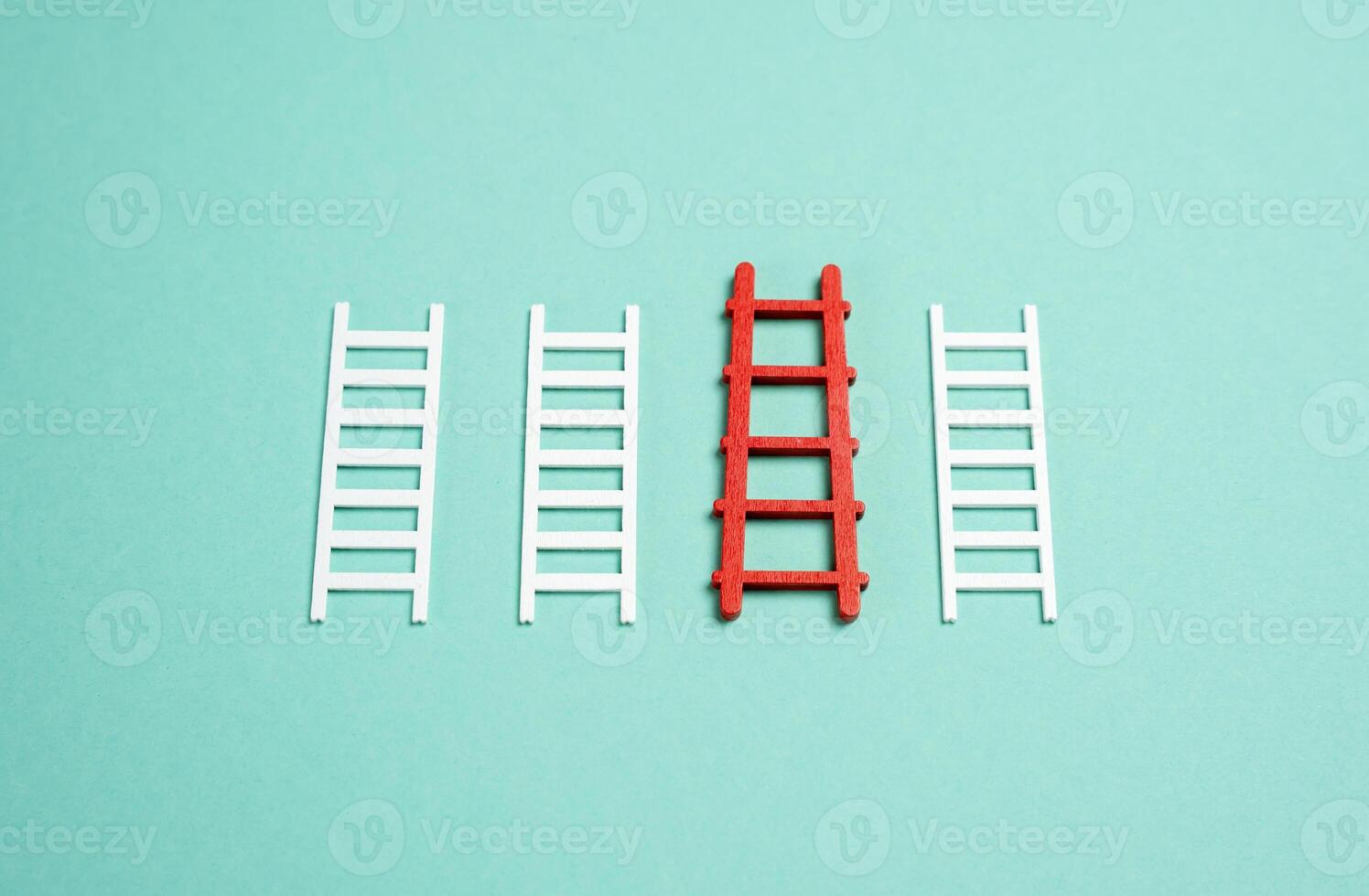 The red ladder stands out among others. The concept of the best of the options and plans. Credit for business. Most effective plan or optimal solution. photo